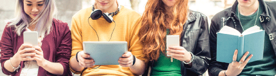 Teens Reading on different devices