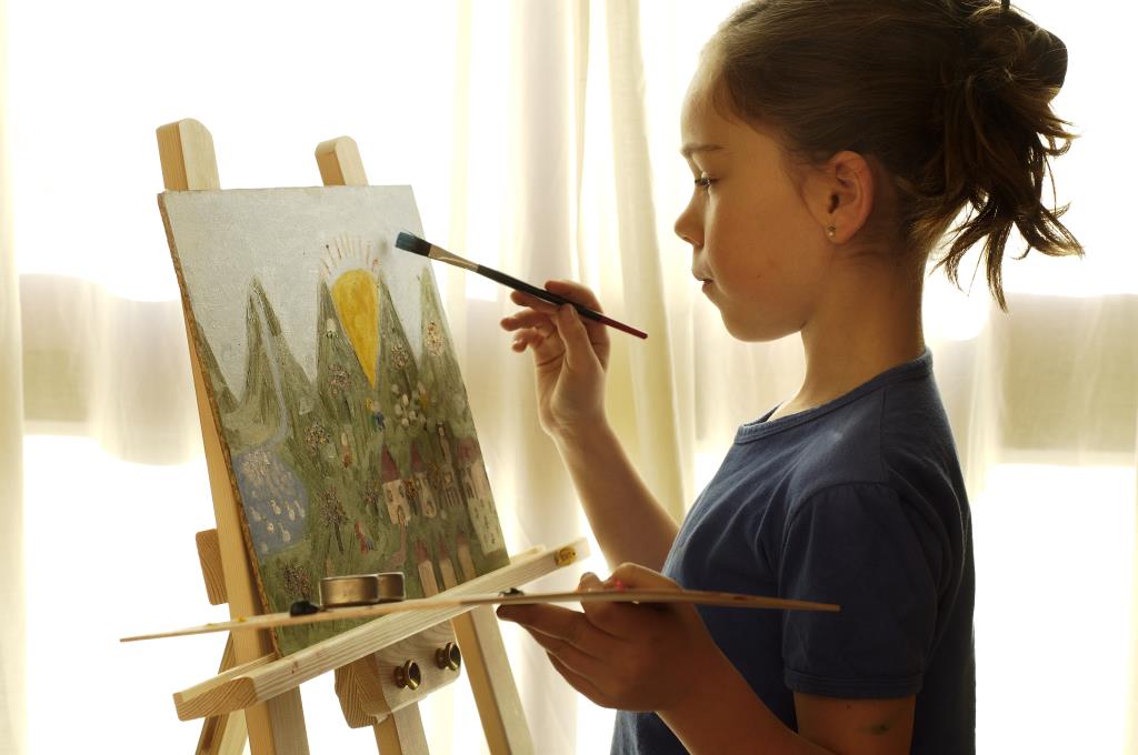 Young girl painting