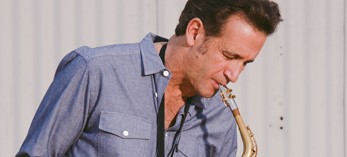 man playing saxophone